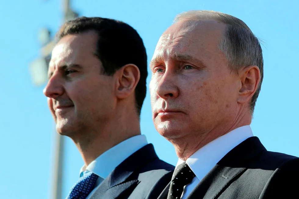 Den krypterte Telegram-appen brukes av blant andre Syrias president Bashar al-Assad (til venstre), som er nær alliert av Russlands president Vladimir Putin. Foto: AP / NTB scanpix