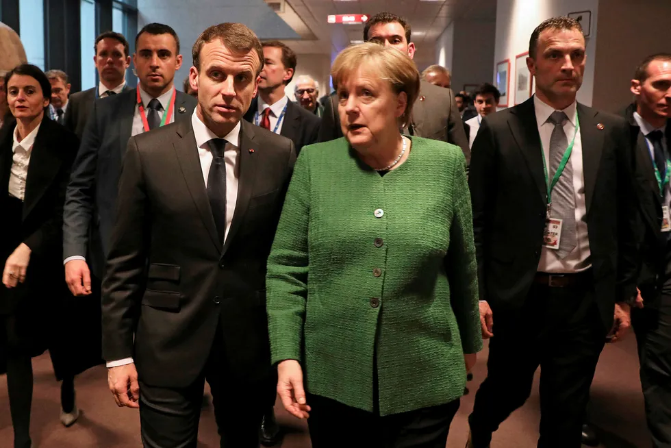 Mens Frankrikes president Emmanuel Macron, Tysklands forbundskansler Angela Merkel og de andre EU-toppene møttes i Brussel, utløste president Donald Trump handelskrig. Foto: Ludovic Marin, NTB Scanpix