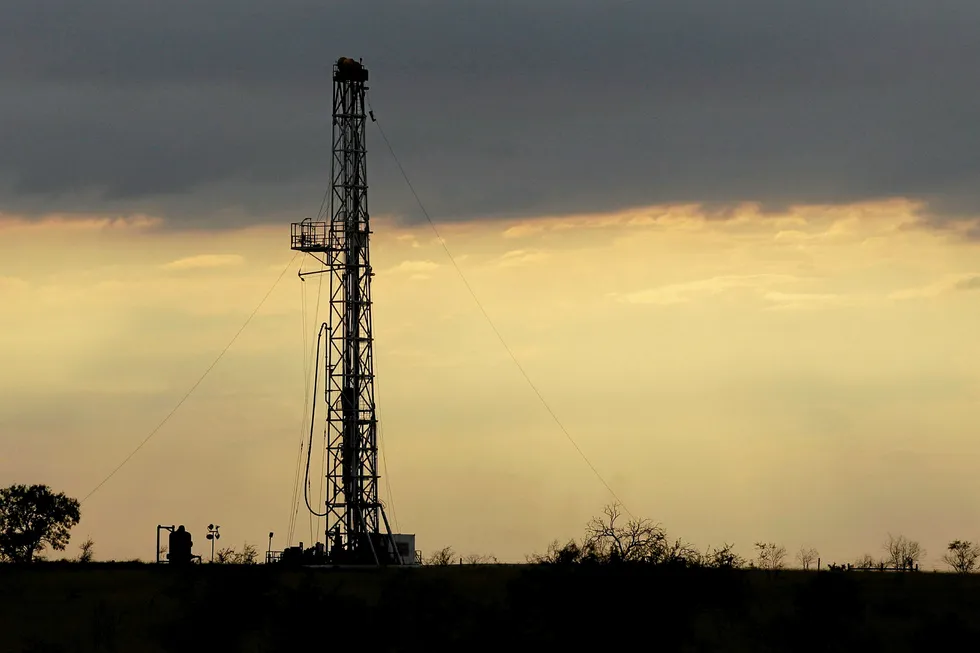 A drilling rig is seen near Kennedy, Texas, Wednesday, May 9, 2012. A UTSA report says South Texas's Eagle Ford Shale oil and gas bonanza supported nearly 48,000 jobs last year while creating overnight boom towns cashing in on a $25 billion economic windfall. The energy rush that started in 2008 mushroomed into nearly 1,700 wells last year.(AP Photo/Eric Gay)