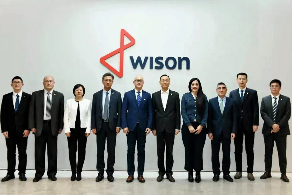 Line-up: Wison chief executive Hua Bangsong (sixth from left) meets Baker Hughes executives.