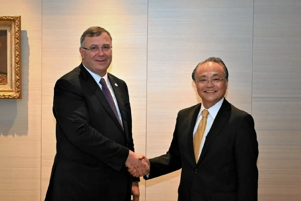 All smiles: TotalEnergies chief executive Patrick Pouyanne and JX Nippon Oil & Gas chief executive Toshiya Nakahara.
