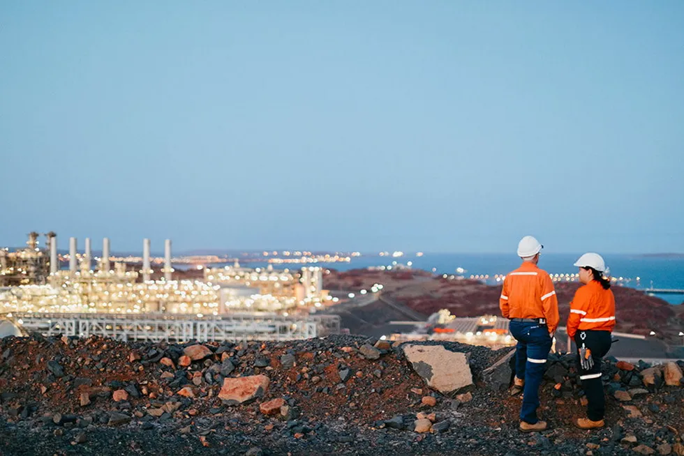 Workers: looking across to the Pluto LNG plant