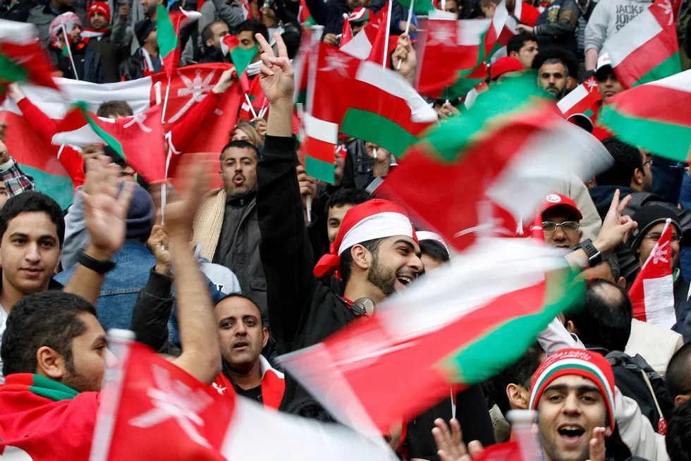 Financing deal: Oman fans wave flags before their men's final Olympic play-off against Senegal