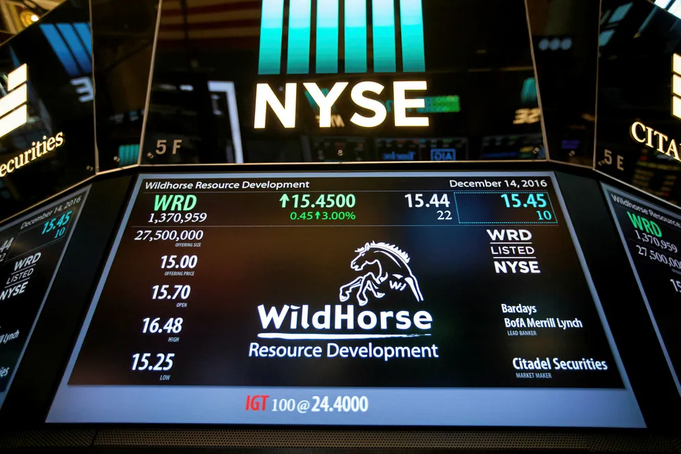 Expanding: a monitor displays data on WildHorse Resource Development at the New York Stock Exchange