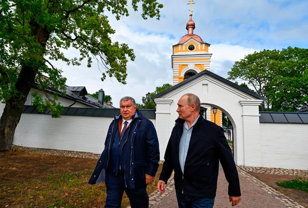Minority report: Rosneft executive board chairman Igor Sechin with Russian President Vladimir Putin