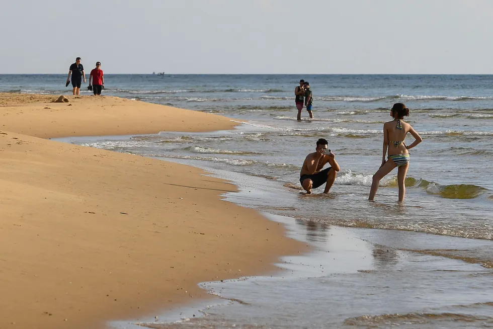Activity: people enjoying themselves at a Vietnamese beach