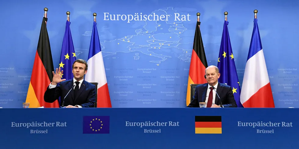French President Emmanuel Macron and German Chancellor Olaf Scholz holding a joint press conference in Brussels in 2021.