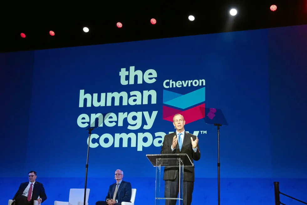 At the lectern: Chevron chief executive Mike Wirth.