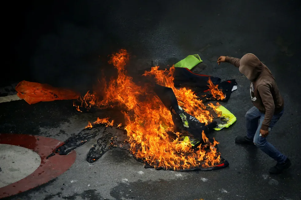 Det har vært en blodig valghelg i Venezuela. Foto: Carlos Garcia Rawlins/Reuters/NTB scanpix