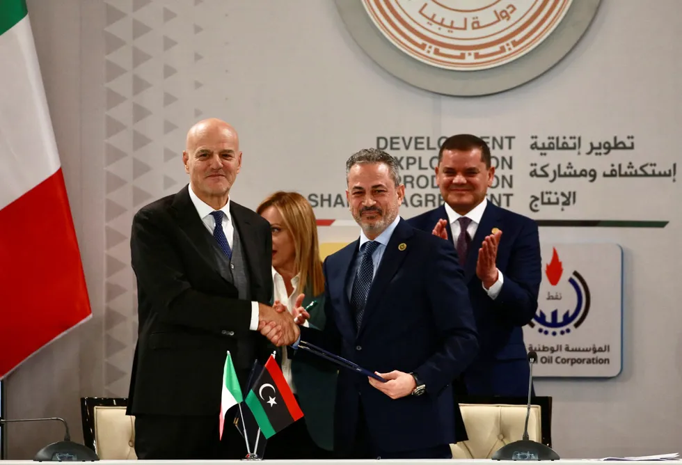 All smiles: Eni chief executive Claudio Descalzi (left) and NOC head Farhat Bengdara shake hands at a signing ceremony in January 2023 covering the Structures A&E project offshore Libya.