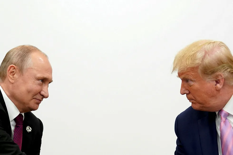 Closing the gap? Russian President Vladimir Putin (left) and US counterpart Donald Trump at an earlier meeting last year
