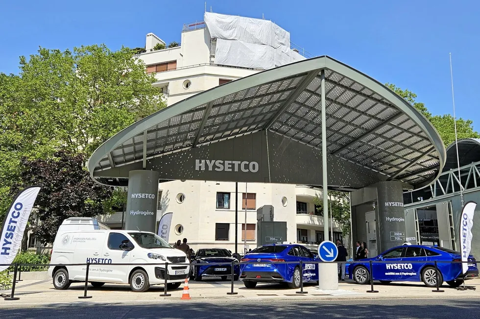 HysetCo's hydrogen filling station in Porte de Saint-Cloud, Paris, alongside some of the vehicles it offers.