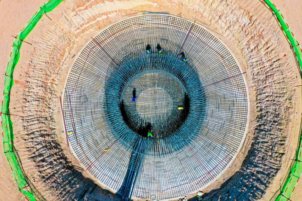 An aerial view of the steel frame of a wind turbine foundation in China, which will later be filled with emissions-heavy concrete. Wind turbines and solar panels produce emissions during manufacturing and installation, and solar-panel factories in China are often powered by coal-fired electricity.