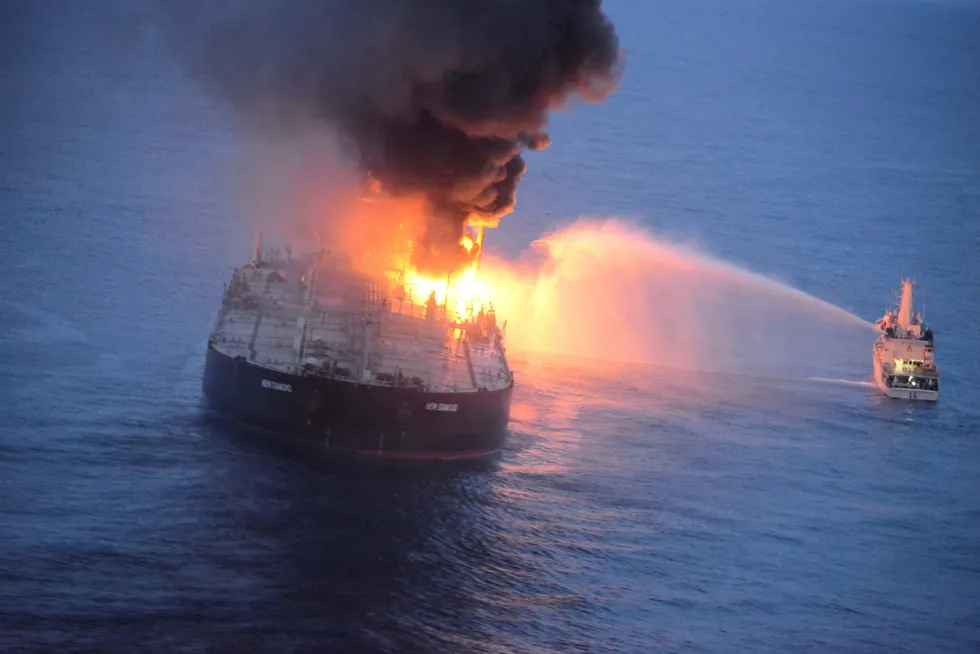Tanker ablaze: A Sri Lankan Navy boat sprays water on the New Diamond, a very large crude carrier (VLCC) chartered by Indian Oil Corporation, that was carrying the equivalent of about 2 million barrels of oil, after a fire broke out off the east coast of Sri Lanka on September 4.