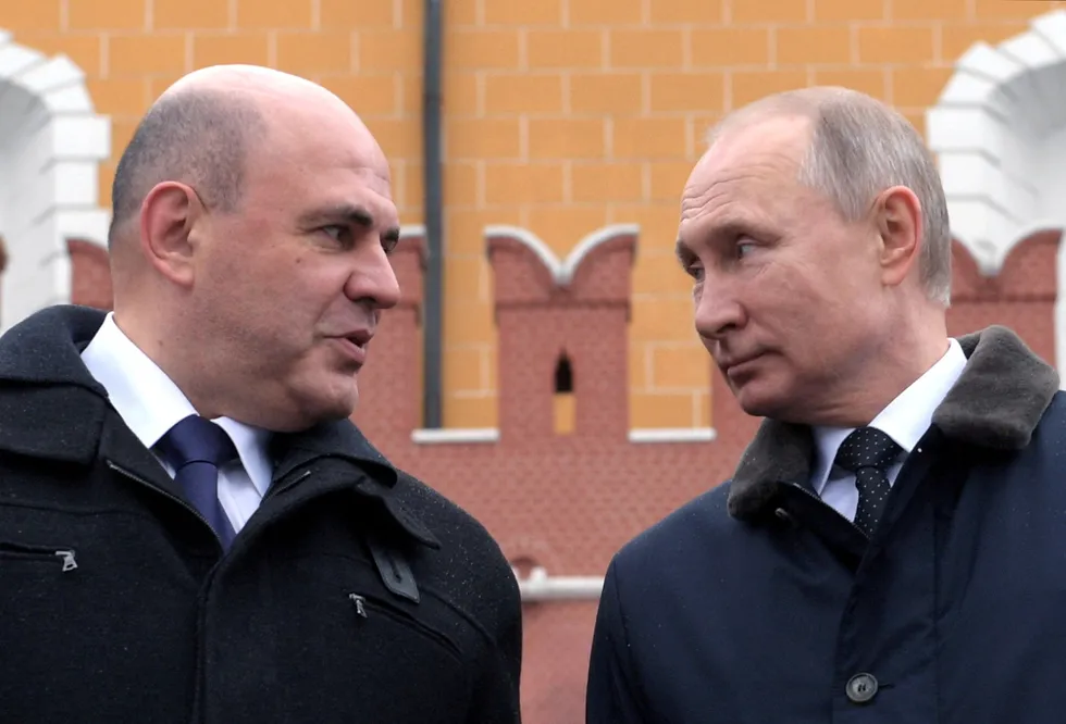 Demands: Russian Prime Minister Mikhail Mishustin (left) and President Vladimir Putin.