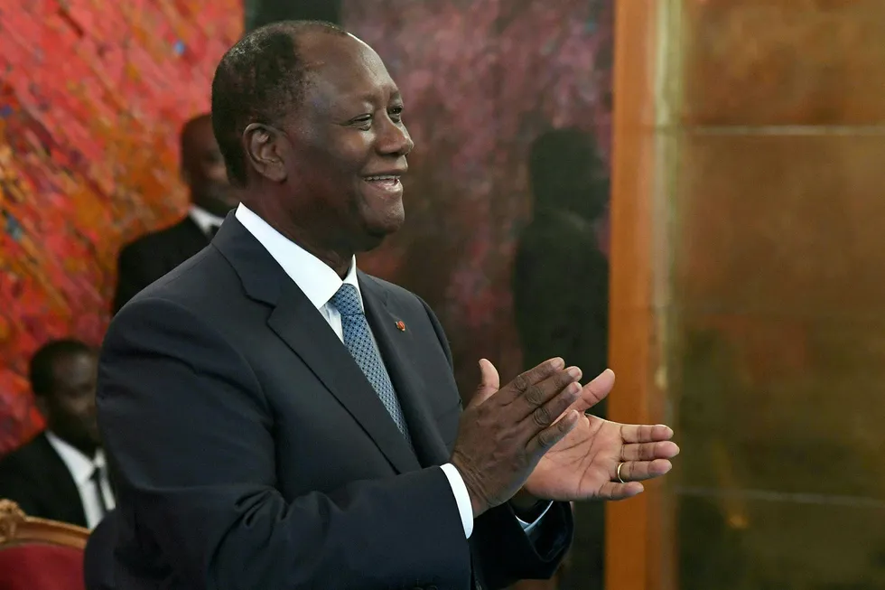 Third-term run: Ivory Coast President Alassane Ouattara applauding during a ceremony at the presidential palace in Abidjan