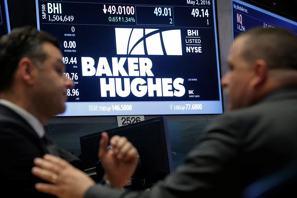 Decisions: A monitor with Baker Hughes share trading details on the New York Stock Exchange.