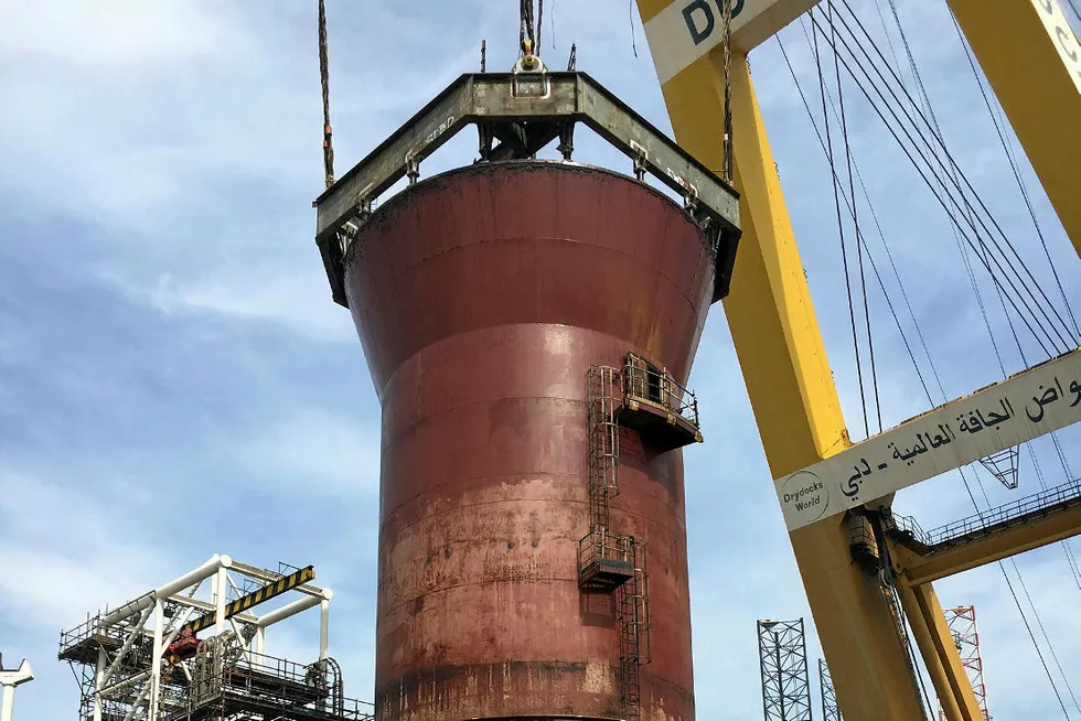 On target: the turret of the Aoka Mizu FPSO, which has been removed from the hull of the vessel for repair, upgrade and life extension work to be carried out, being lowered onto the cone module of the Lancaster EPS buoy