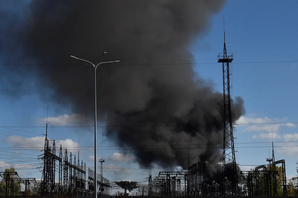 Pall: smoke rises over power lines in the western Ukrainian city of Lviv.