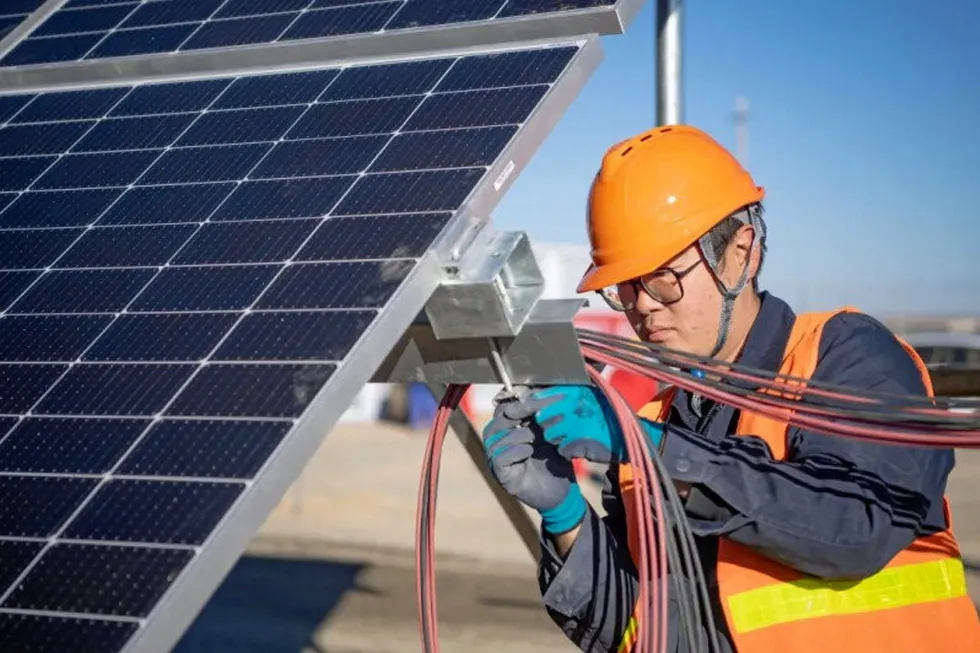 At work: photovoltaics being connected with the grid at the Yumen oilfield