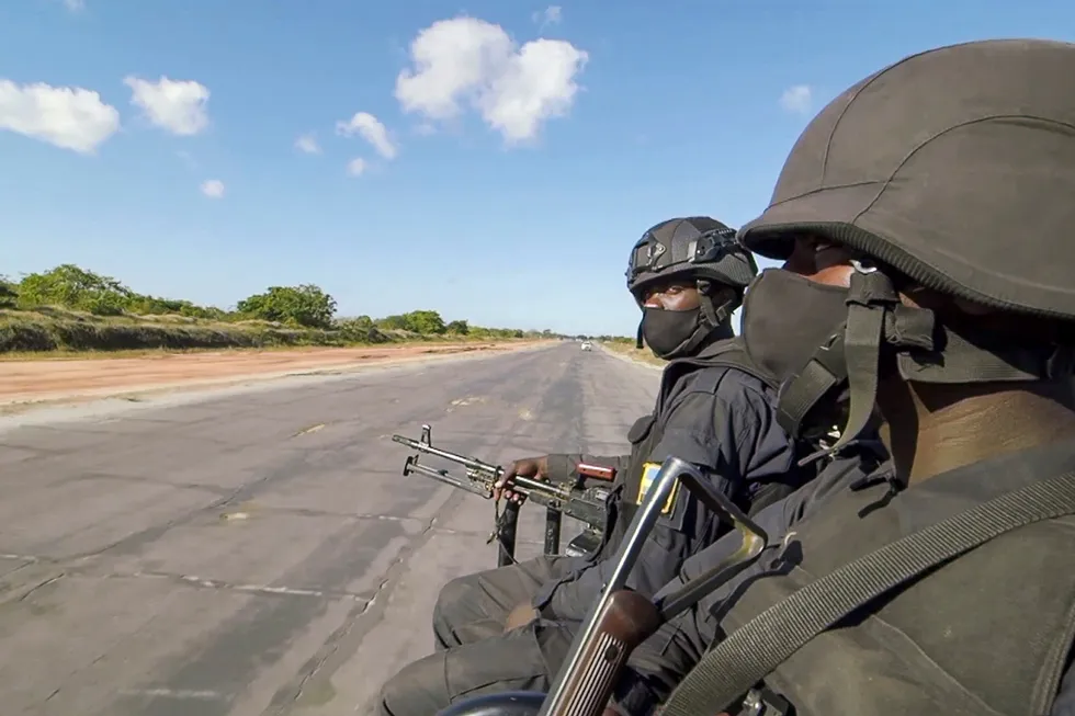 Security detail: Rwandan troops travel by road near the airstrip in Afungi, Cabo Delgado province, Mozambique in 2021.