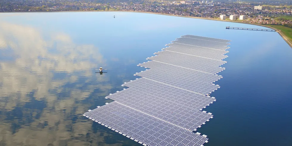 As the UK sweltered its solar fleet stepped up, including this floating installation near London.