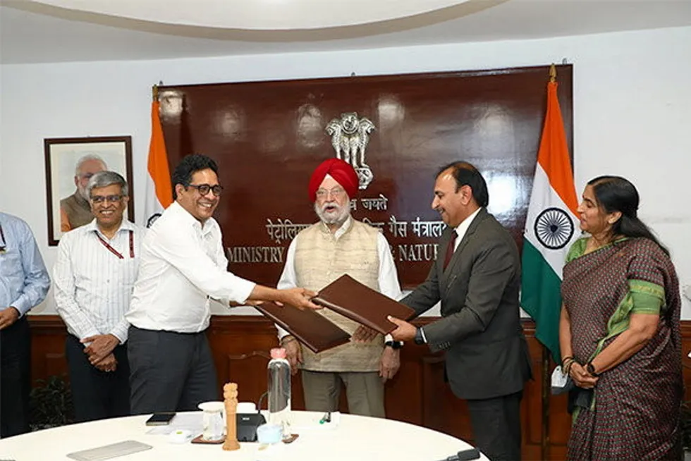 In agreement: Officials from ONGC, Greenko sign MoU for green energy JV in presence of Indian Petroleum Minister Hardeep Singh Puri