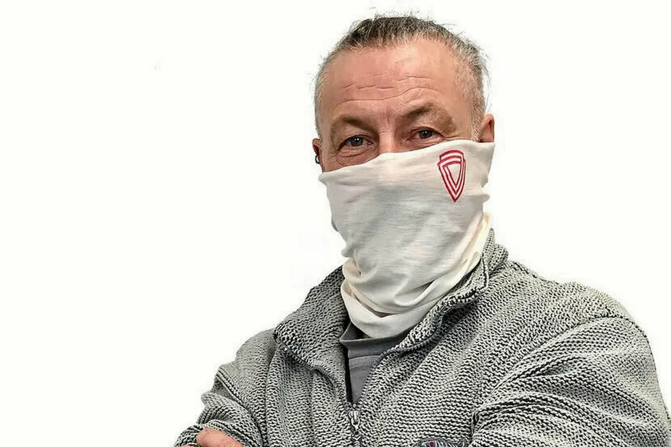 Protection: the new snood will be given to all UK oil and gas workers to wear during offshore flights