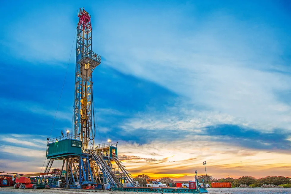 Hit hard: an onshore drilling rig is pictured in this file photo. A combination of negative factors forced both Brent and West Texas Intermediate crude oil prices down significantly on Tuesday