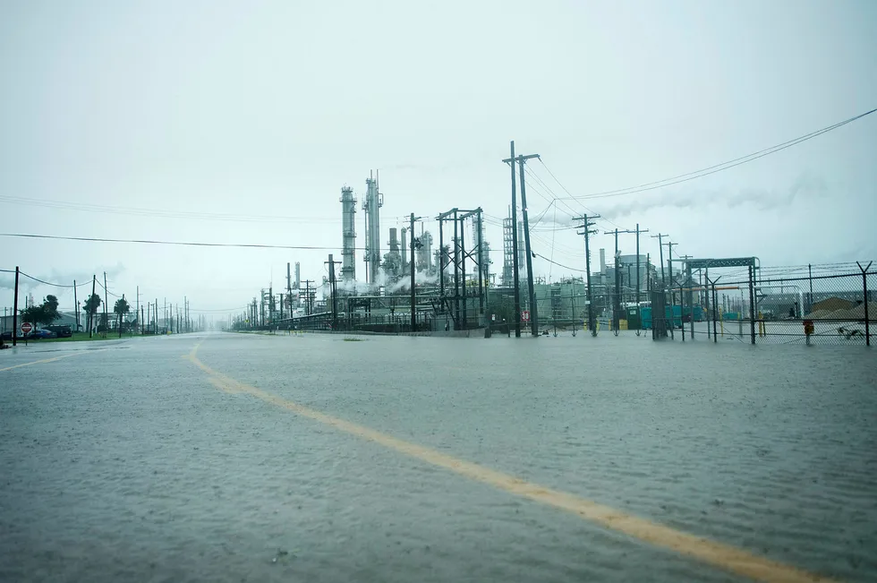 Harvey hits: a view of the Marathon Texas City Refinery as rain from Hurricane Harvey floods a road on 26 August