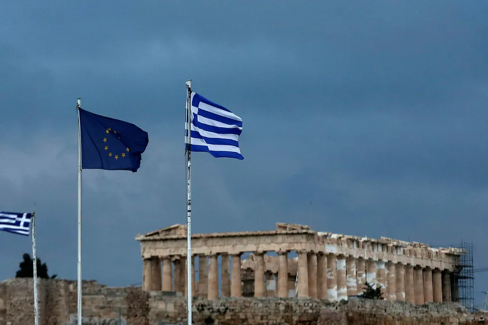 IMF mener Hellas ikke vil klare å betjene landets høye gjeld. Foto: Yorgos Karahalis/AP photo/NTB Scanpix
