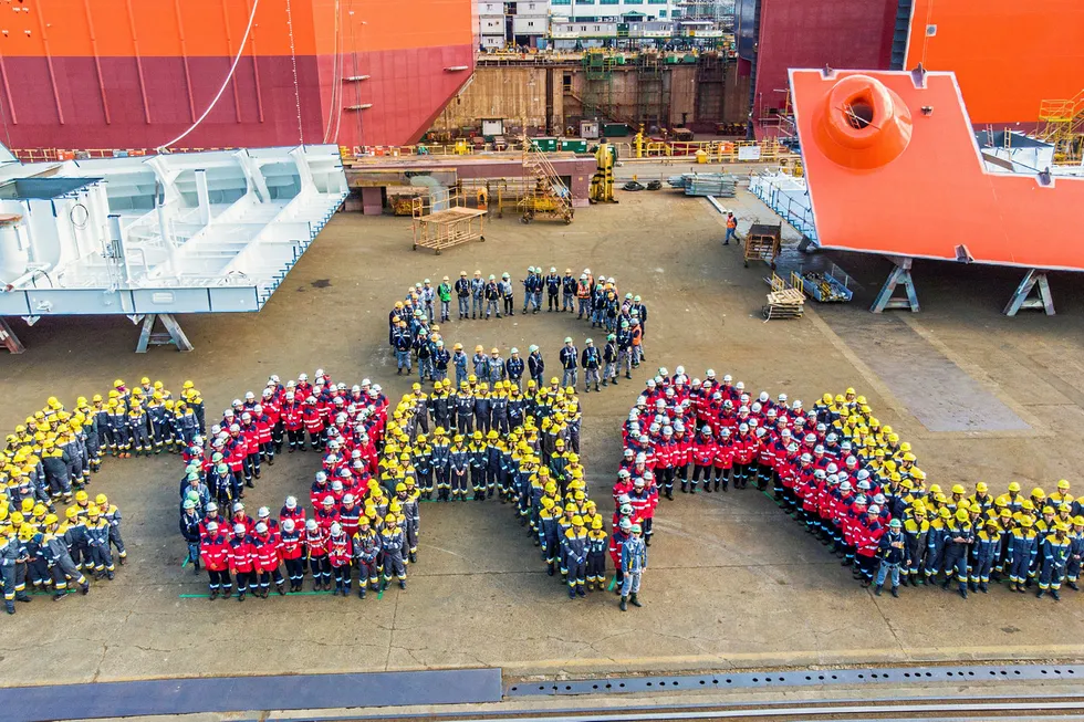 Nameplate: Samsung workers spell out the project name during the ceremony for the hull launch.