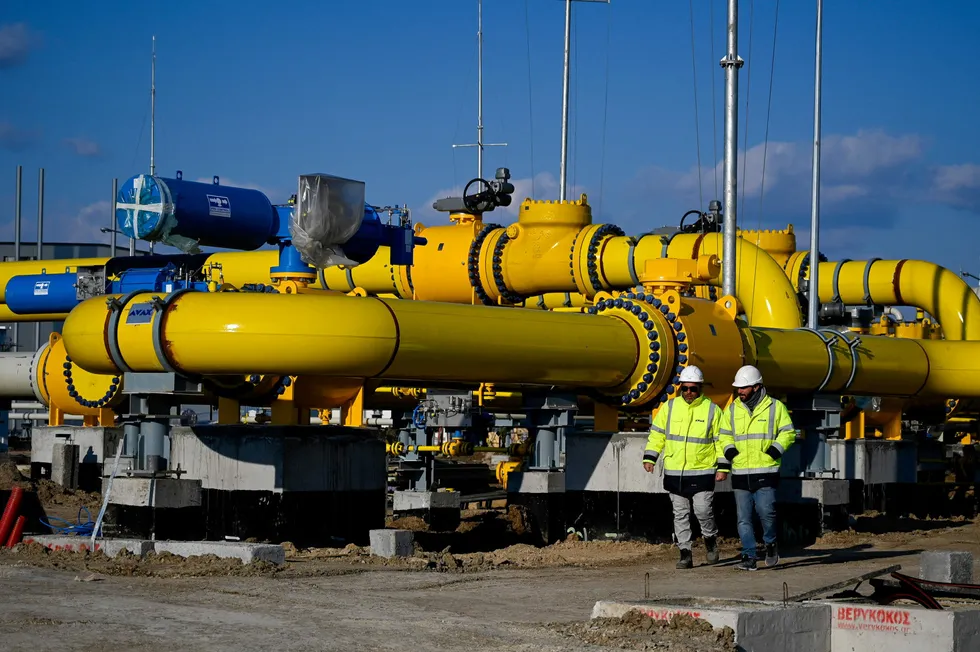 Just in time: Employees walk at a construction site of a gas metering station on the Interconnector Greece-Bulgaria, linking the Trans Adriatic Pipeline in Greece with Bulgaria’s gas trunkline network.