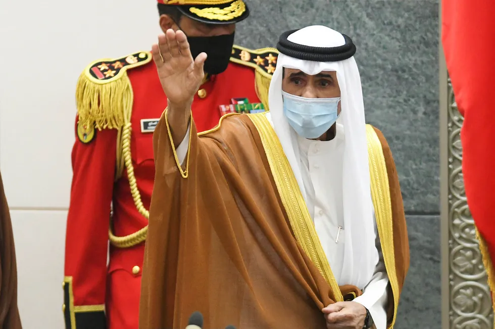 Succession: the new Emir of Kuwait, Sheikh Nawaf Al Ahmad Al Sabah, waves after taking the oath at the Kuwaiti National Assembly