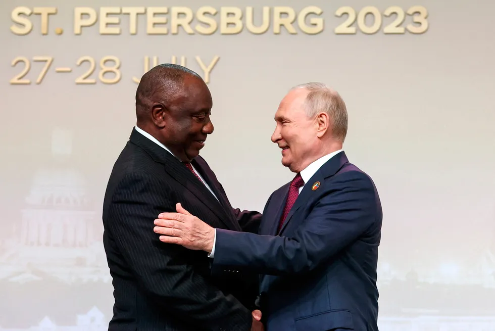 Links: South Africa President Cyril Ramaphosa (left) and Russian President Vladimir Putin shake hands in St Petersburg, Russia, in July 2023.