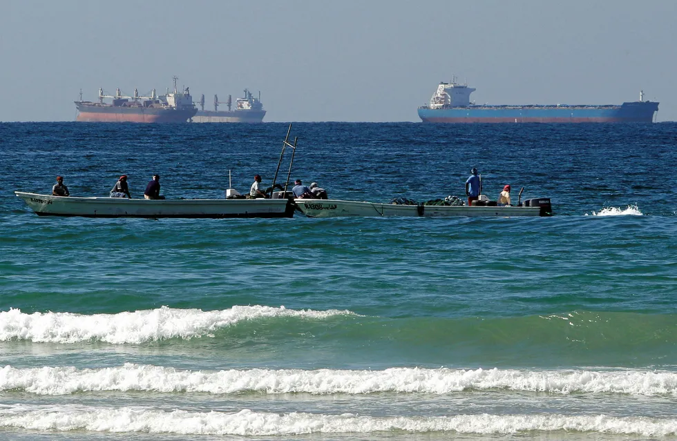 Busy waters: fishing boats and oil tankers in the Persian Gulf off the emirate of Ras Al Khaimah in the United Arab Emirates