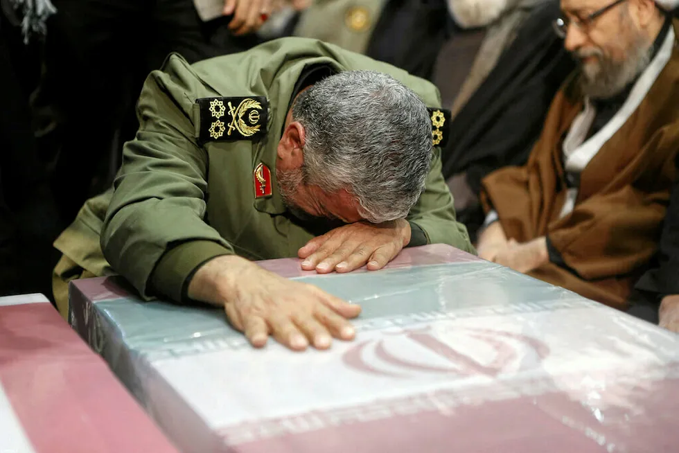In mourning: Brigadier General Esmail Ghaani, the newly appointed commander of Iran's Quds Force, reacts during the funeral prayer of the coffins of Iranian Major-General Qassem Soleimani and Iraqi militia commander Abu Mahdi al-Muhandis, who were killed in an air strike at Baghdad airport