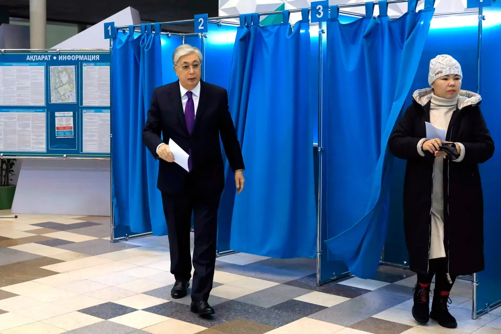 Firm steps: President Kassym-Jomart Tokayev casts his ballot in Astana, Kazakhstan.
