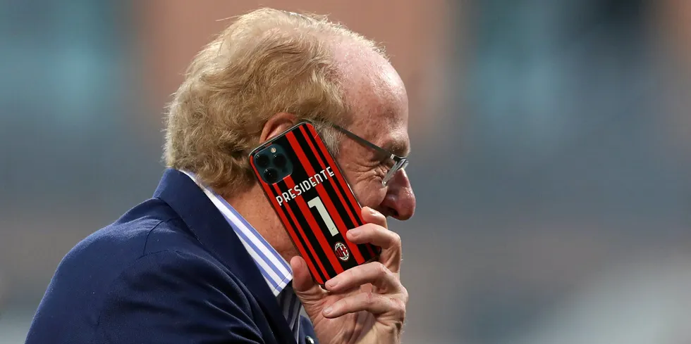 Paolo Scaroni President of AC Milan and new chair of Enel, pictured using his mobile phone bearing a case with the name President and number 1 during a Serie A match.