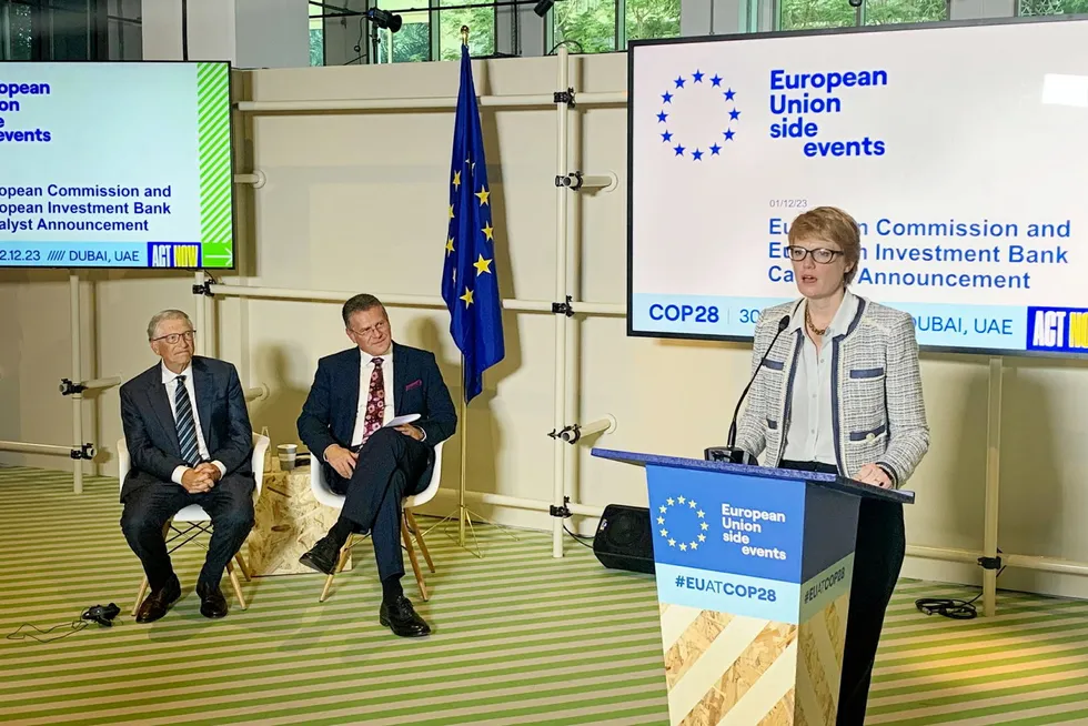 Bill Gates (left) and European Commission executive vice president Maroš Šefčovič (centre) watch a speech by Olivia Breese (right), power-to-X CEO at Orsted.