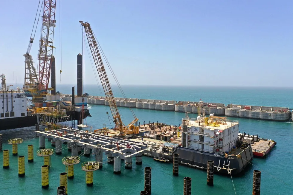 Busy: activities under way at BP’s Greater Tortue Ahmeyim site off Mauritania and Senegal, with the breakwater in the background and the foundation of the LNG mooring and transfer platform in the foreground