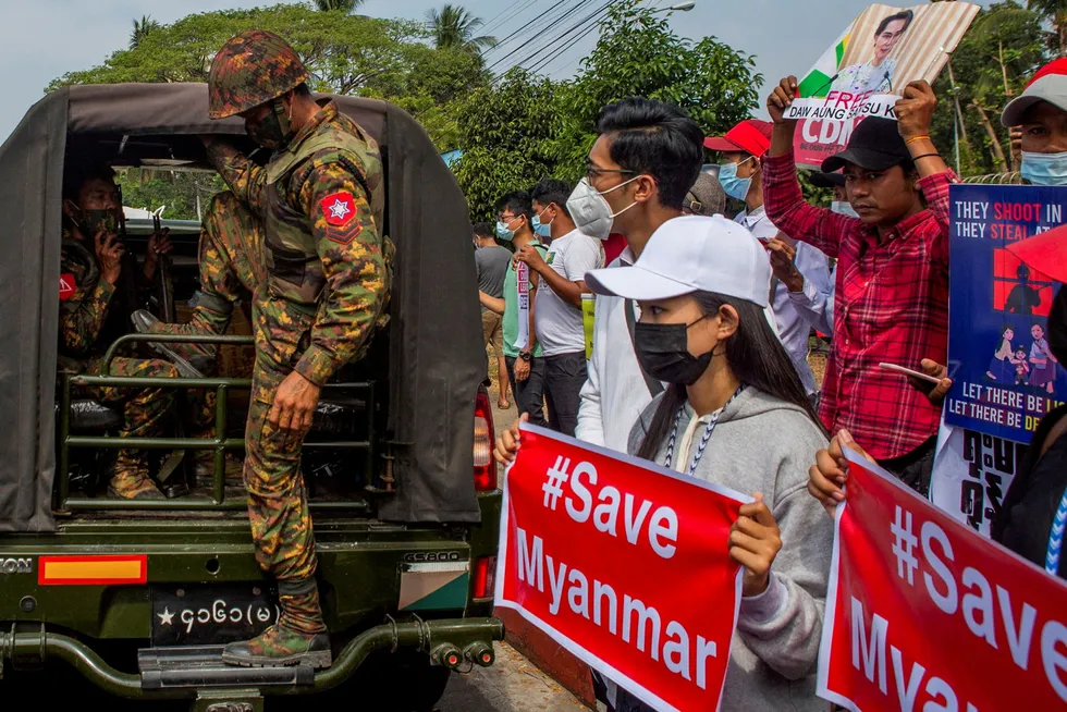 Demonstration: a soldier steps out of a military vehicle outside Myanmar's Central Bank in Yangon during a protest against the military coup