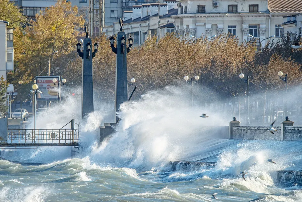 Intense: High waves splash over an embarkment in the Russian Black Sea port of Novorossiysk earlier in March 2022