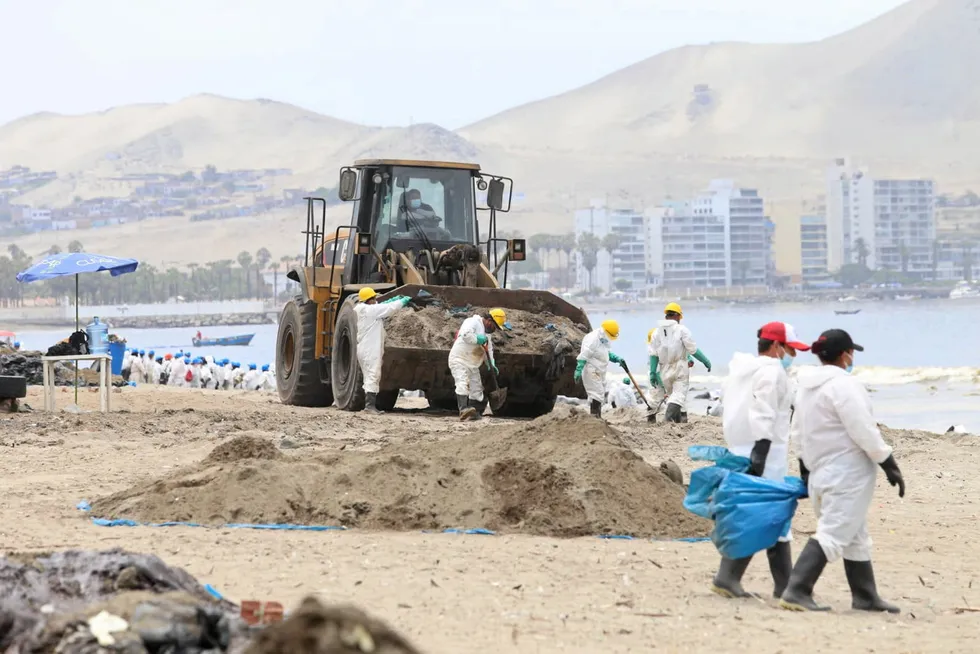 Clean up: Repsol deployed 1,800 workers to help clean up Peru's beaches after spilling 6000 barrels of oil