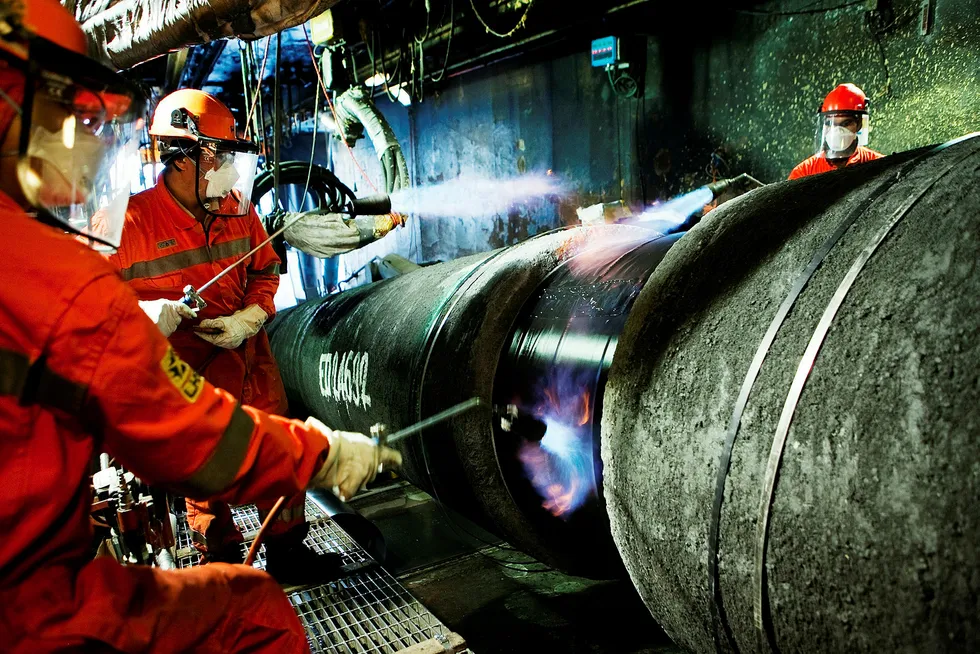 Arbeidere jobber med legging av Nord Stream-gassrørledningen i Østersjøen i 2011. Foto: Tim Fadek/Bloomberg