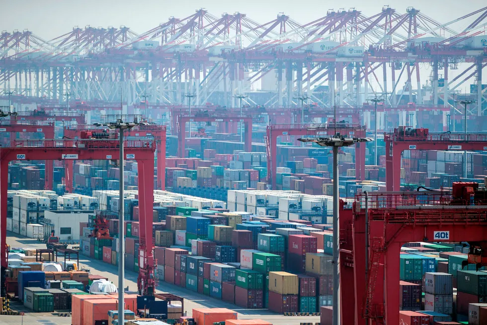 Bildet viser Yangshan Deep Water Port i Shanghai. Foto: JOHANNES EISELE/AFP Photo