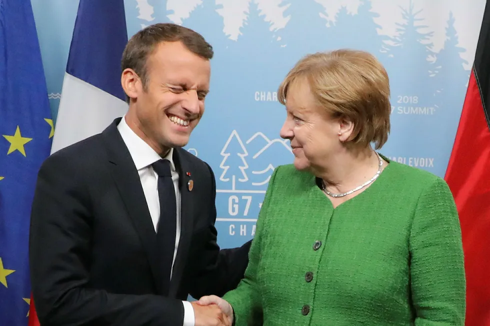 Frankrikes president Emmanuel Macron og den tyske forbundskansleren Angela Merkel er veldig nære en avtale. Foto: LUDOVIC MARIN