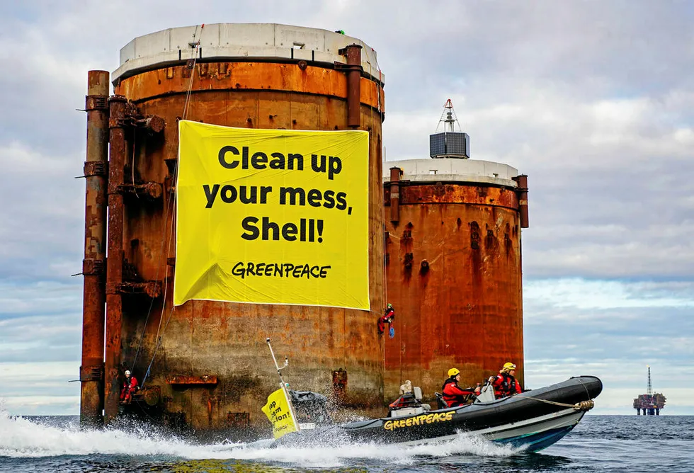 In Scotland, UK: Greenpeace activists from the Netherlands, Germany and Denmark board oil platforms in Shell's Brent field