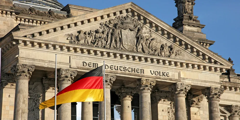 German flag in front of the Bundestag (lower house of parliament) in Berlin