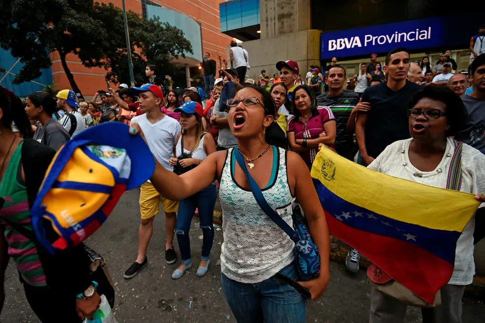 Under folkeavstemningen på søndag var det store protester mot Venezuelas president Maduro. Foto: JUAN BARRETO